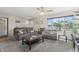 Bright living room showing comfortable seating, lots of natural light, and stylish decor at 6802 S 44Th Pl, Phoenix, AZ 85042