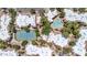 Community aerial view featuring pool, tennis court, and surrounding desert landscaping at 750 E Northern Ave # 2006, Phoenix, AZ 85020