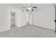 Clean bedroom with carpet, a ceiling fan, and two doors, one to the closet and another to the hall at 750 E Northern Ave # 2006, Phoenix, AZ 85020