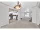 Open-concept layout with a living room, dining area, and kitchen with stainless steel appliances at 750 E Northern Ave # 2006, Phoenix, AZ 85020