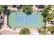Aerial view of community tennis court surrounded by desert landscaping at 750 E Northern Ave # 2006, Phoenix, AZ 85020