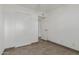 This bedroom boasts a closet, tile floor and neutral decor at 8211 E Garfield St # J219, Scottsdale, AZ 85257
