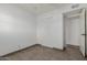 This bedroom has a standard closet and tile floor at 8211 E Garfield St # J219, Scottsdale, AZ 85257