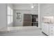 Updated kitchen features stainless appliances, tiled countertops, and an open layout at 8211 E Garfield St # J219, Scottsdale, AZ 85257