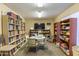 Well-lit library with book-lined walls, tables, and chairs, creating a peaceful atmosphere at 8211 E Garfield St # J219, Scottsdale, AZ 85257