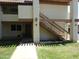 Charming two-story exterior with well-maintained landscaping, complemented by inviting stairs at 8838 N 8Th St # 105, Phoenix, AZ 85020