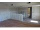 Living room and kitchen featuring ample space for renovation at 8838 N 8Th St # 105, Phoenix, AZ 85020