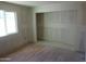 Bright living room with fresh drywall and wood floors at 8838 N 8Th St # 105, Phoenix, AZ 85020
