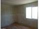 Bright living room with fresh drywall and wood floors at 8838 N 8Th St # 105, Phoenix, AZ 85020