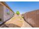 This backyard offers a private outdoor space with potential for landscaping and customization at 888 S 165Th Ln, Goodyear, AZ 85338
