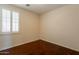 Small bedroom with a large window with shutters at 888 S 165Th Ln, Goodyear, AZ 85338