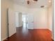 Bright bedroom features a ceiling fan and an open doorway leading to the next room at 888 S 165Th Ln, Goodyear, AZ 85338