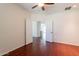 Bedroom featuring french doors and wood floors at 888 S 165Th Ln, Goodyear, AZ 85338