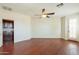 Bedroom with wood floors, recessed lights, and an exterior door at 888 S 165Th Ln, Goodyear, AZ 85338