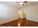 Spacious bedroom featuring chair rail and an open door to the next room at 888 S 165Th Ln, Goodyear, AZ 85338