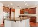 Gourmet kitchen featuring a large island, stainless steel appliances, and granite countertops at 888 S 165Th Ln, Goodyear, AZ 85338