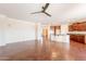 Spacious living room with neutral walls and tile floors, perfect for relaxing or entertaining guests at 888 S 165Th Ln, Goodyear, AZ 85338