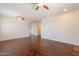 Open living room area with stained concrete floors and ample natural light at 888 S 165Th Ln, Goodyear, AZ 85338