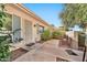 Close-up of the inviting front entrance, featuring security door and well-placed landscaping at 10205 W Royal Oak Rd, Sun City, AZ 85351