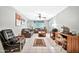 Spacious living room with natural light, tile floors, and a comfortable seating area at 10205 W Royal Oak Rd, Sun City, AZ 85351