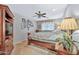 Inviting main bedroom with cozy decor, a comfortable bed, and ample natural light at 10205 W Royal Oak Rd, Sun City, AZ 85351