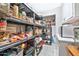 Organized pantry featuring shelving, providing ample storage space at 10205 W Royal Oak Rd, Sun City, AZ 85351