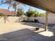 Spacious covered patio and backyard featuring desert landscaping at 1249 E Commerce Ave, Gilbert, AZ 85234