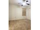Bedroom with carpet flooring and a ceiling fan, with a single window at 1249 E Commerce Ave, Gilbert, AZ 85234