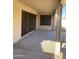 Covered patio with concrete flooring providing shaded outdoor living and entertainment at 1249 E Commerce Ave, Gilbert, AZ 85234