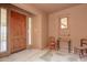 Charming home entrance with a rich wood door, complemented by stylish interior decor at 13600 N Fountain Hills Blvd # 501, Fountain Hills, AZ 85268