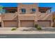 View of the townhouses with attached garages and a nice exterior design with balconies at 13600 N Fountain Hills Blvd # 501, Fountain Hills, AZ 85268