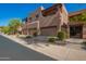 View of beautiful townhouses featuring attached garages, landscaped grounds and balconies at 13600 N Fountain Hills Blvd # 501, Fountain Hills, AZ 85268