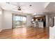 Spacious living room featuring gleaming hardwood floors, with a seamless transition to the open kitchen at 13600 N Fountain Hills Blvd # 501, Fountain Hills, AZ 85268