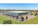 Modern community clubhouse with large windows and landscaping at 16717 W Questa Dr, Surprise, AZ 85387