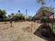 Large backyard area with mature trees and landscaping at 1813 E Willetta St, Phoenix, AZ 85006