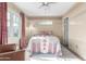 Cozy bedroom with natural light, a comfortable bed, and calming color scheme at 1813 E Willetta St, Phoenix, AZ 85006