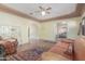 Bright and airy living room with hardwood floors, fireplace, and archway leading to other rooms at 1813 E Willetta St, Phoenix, AZ 85006