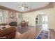 Spacious living room featuring a fireplace, hardwood flooring, and an arched doorway at 1813 E Willetta St, Phoenix, AZ 85006