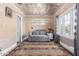 Comfortable sitting room with unique ceiling tiles, and neutral tones at 1813 E Willetta St, Phoenix, AZ 85006