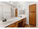 Bright bathroom features a double vanity and ample counter space and storage at 19400 N Westbrook Pkwy # 220, Peoria, AZ 85382