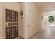 Front door with security gate, leading to the unit, and storage closet at 19400 N Westbrook Pkwy # 220, Peoria, AZ 85382