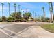 Community entrance with roundabout and fountain at 19400 N Westbrook Pkwy # 220, Peoria, AZ 85382