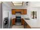 Kitchen boasts stainless steel appliances and bright countertops at 19400 N Westbrook Pkwy # 220, Peoria, AZ 85382