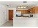 Kitchen with stainless steel appliances and breakfast bar at 19400 N Westbrook Pkwy # 220, Peoria, AZ 85382
