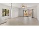 A bright, open living room space with balcony access and natural light at 19400 N Westbrook Pkwy # 220, Peoria, AZ 85382