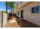 A cozy backyard with patio stones and gravel at 2000 N 36Th St # 10, Phoenix, AZ 85008