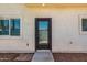 A backyard door between two windows at 2000 N 36Th St # 10, Phoenix, AZ 85008