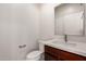 Powder room with a modern vanity, a stylish sink, and a mirror at 2000 N 36Th St # 10, Phoenix, AZ 85008