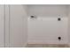 Laundry room with essential utility hookups ready for appliances and cleaning products at 2000 N 36Th St # 10, Phoenix, AZ 85008