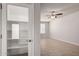 Pantry next to a room featuring neutral paint and a ceiling fan at 2000 N 36Th St # 10, Phoenix, AZ 85008